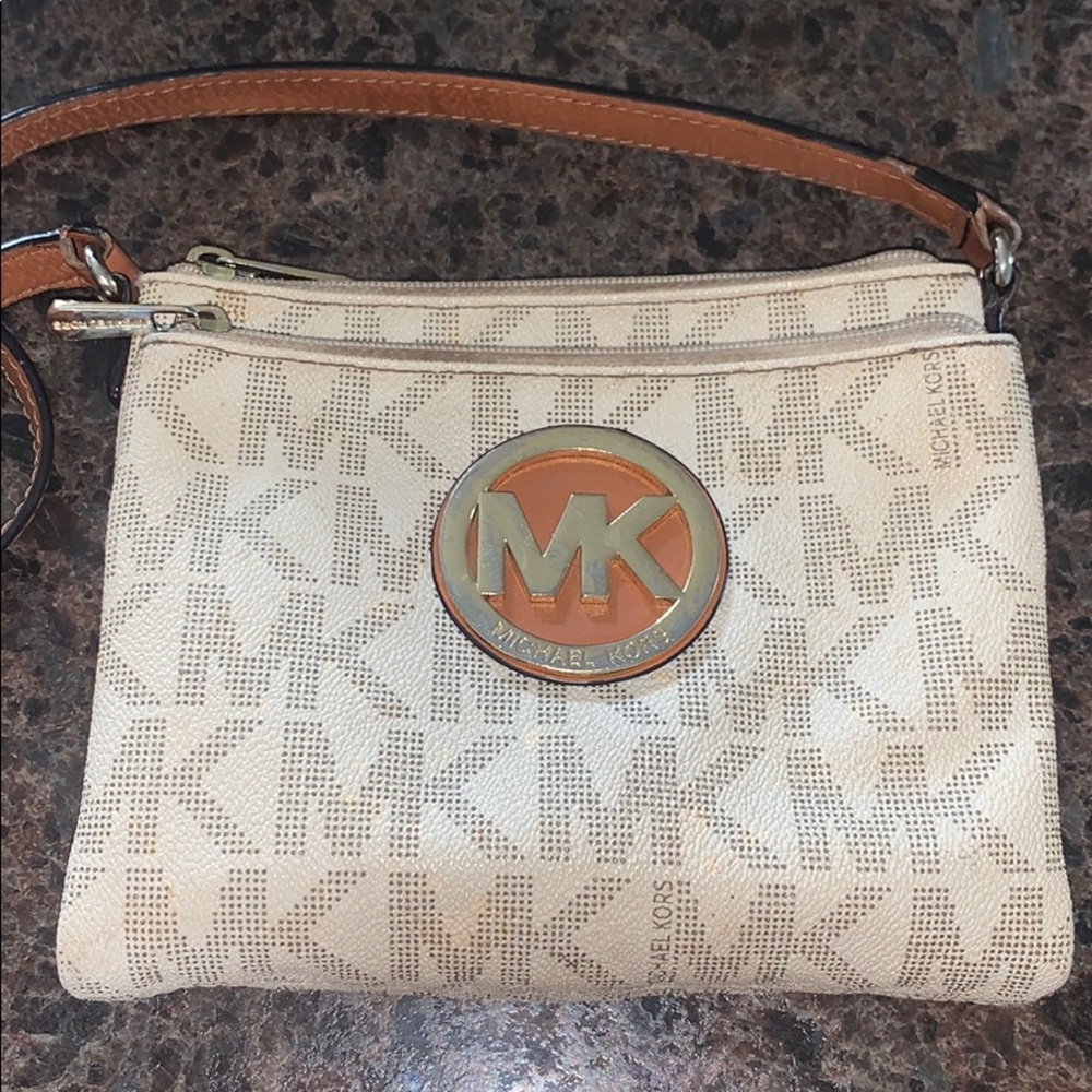 Women’s crossbody Michael Kors purse